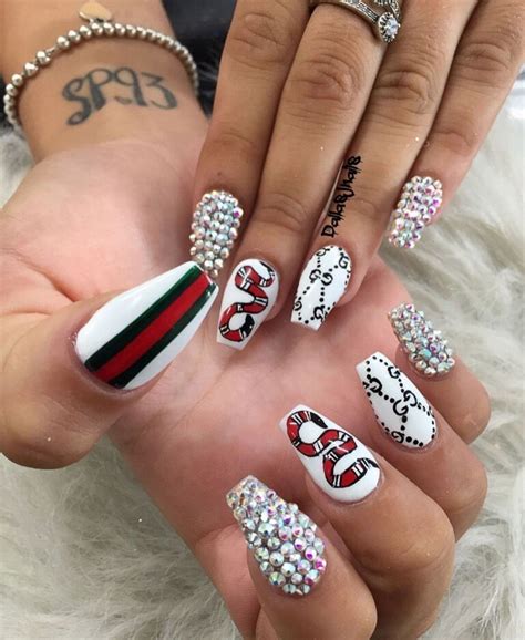 gucci nails with diamonds.